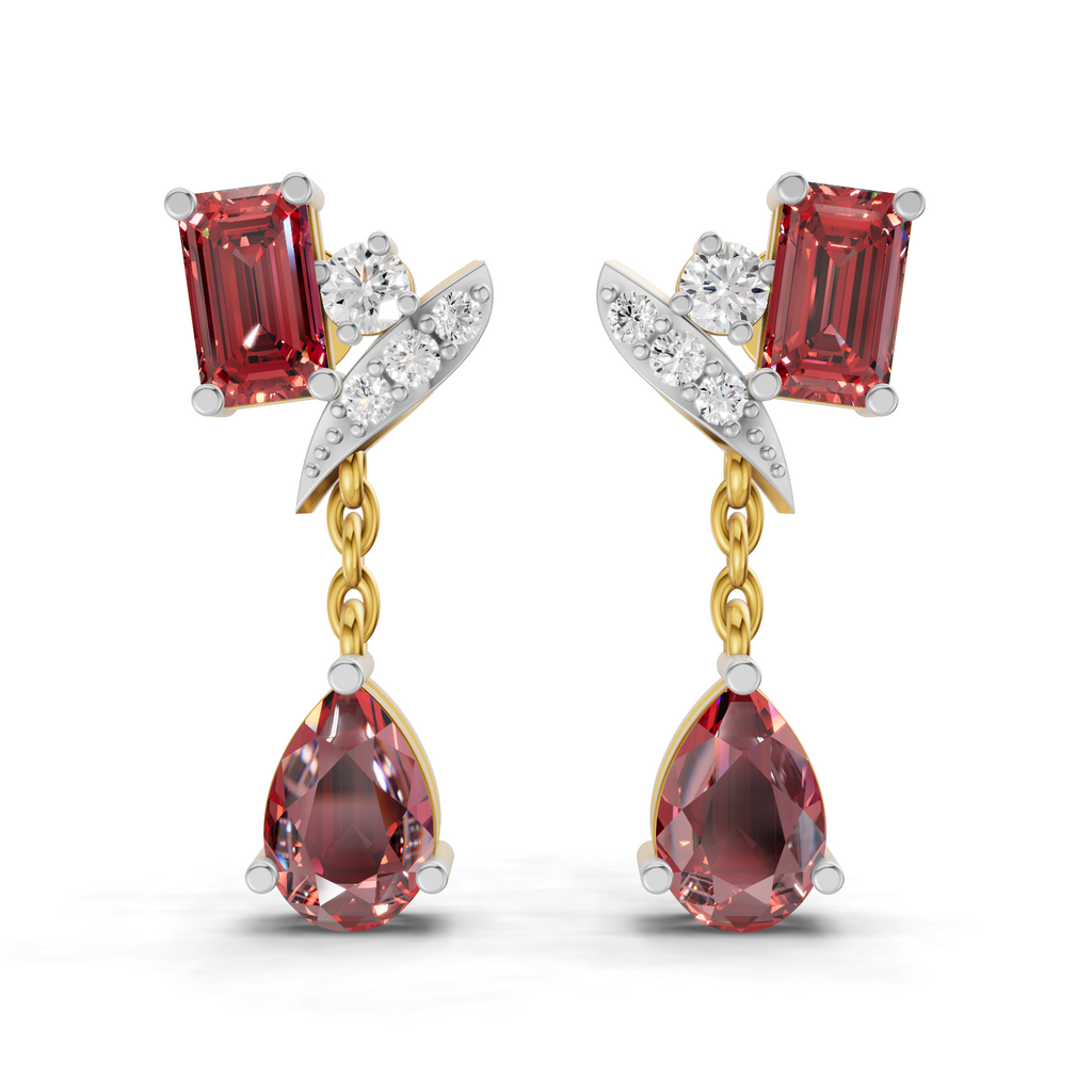 A pair of gold and white gold drop earrings featuring rectangular red gemstones, round clear accent stones, and teardrop-shaped red gemstones, shown on a white background.