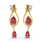 A pair of gold and white gold drop earrings featuring pear-cut pink gemstones and small clear accent stones, shown on a plain white background.