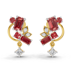 A pair of gold and white gold drop earrings featuring baguette-cut red sapphires, round red sapphires, and clear accent diamonds on a white background.