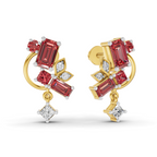 A pair of gold and ruby red gemstone earrings with small clear accent stones, shown on a clean white background.