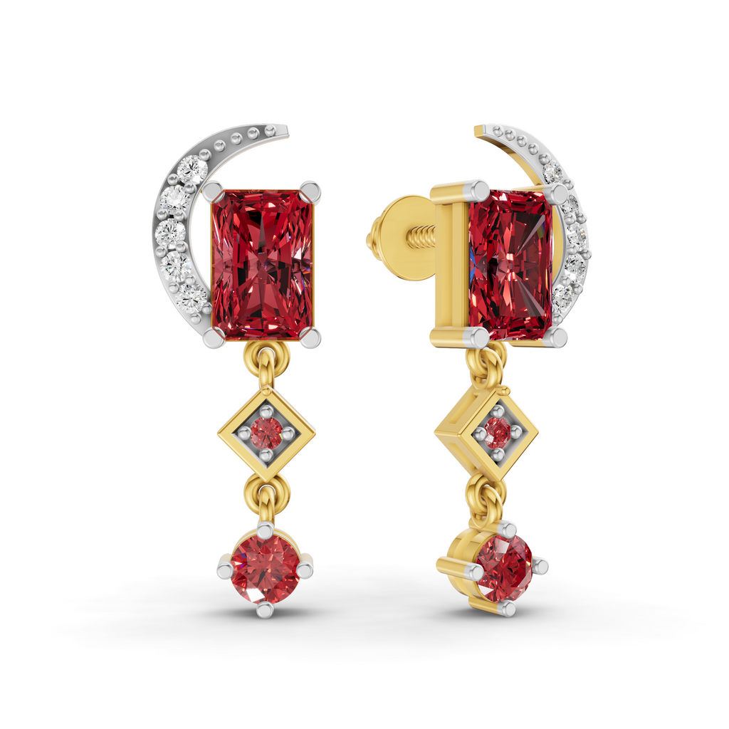 A pair of gold and silver drop earrings featuring rectangular red gemstones, small round clear stones, and a crescent moon detail, shown on a white background.