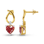 A pair of gold and white gold drop earrings featuring a heart-shaped red gemstone and a small clear diamond accent, shown from both front and side angles on a white background.