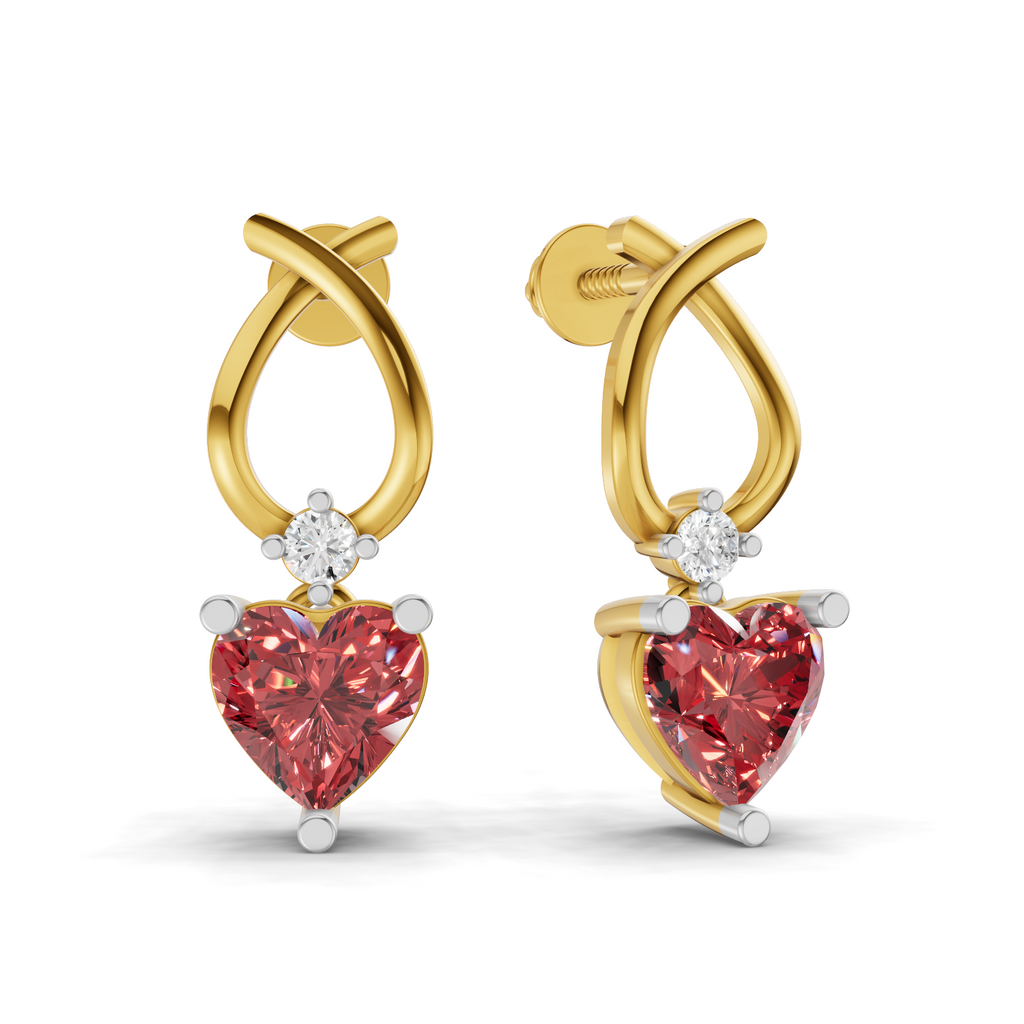 A pair of gold huggie hoop earrings with a dangling heart-shaped pink gemstone and a small clear round stone above it, shown on a white background.