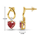Gold and white gold drop earrings with a heart-shaped pink gemstone and a small clear accent stone, shown with dimension markings of 18.00 mm height and 4.