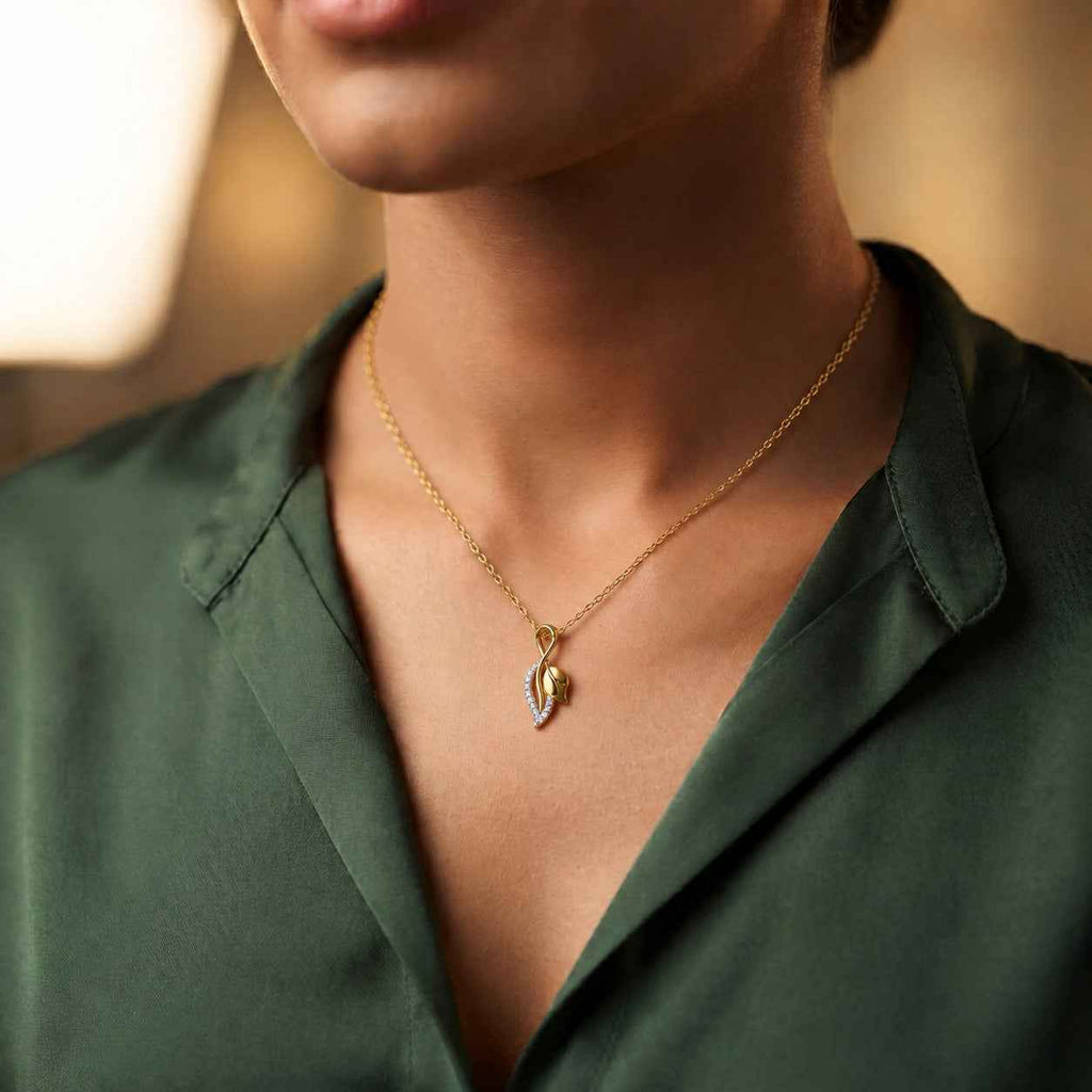 SPARQ Two-Tone Gold Leaf & Diamond Swirl Pendant