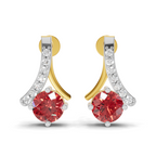 A pair of gold and silver drop earrings with a large round red gemstone and a curved row of small clear stones, shown on a white background.